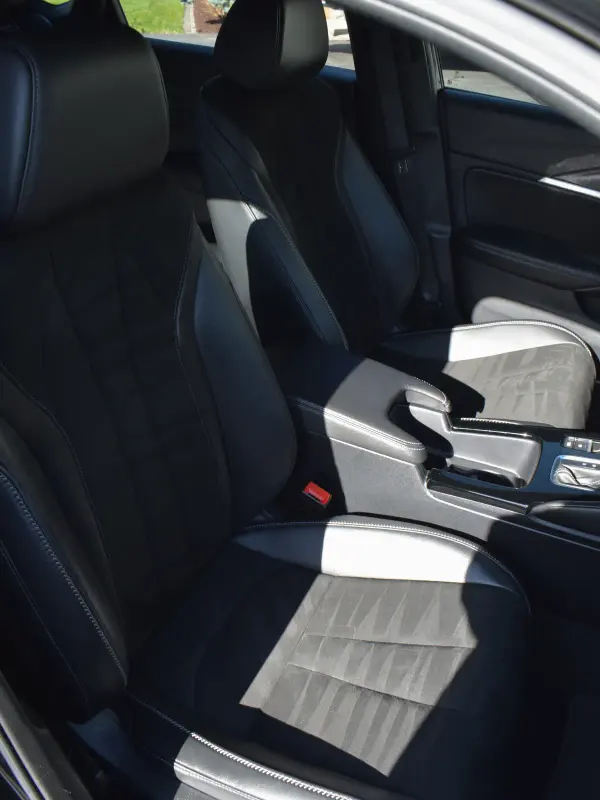 Two-tone Acura Integra seats vacuumed and conditioned